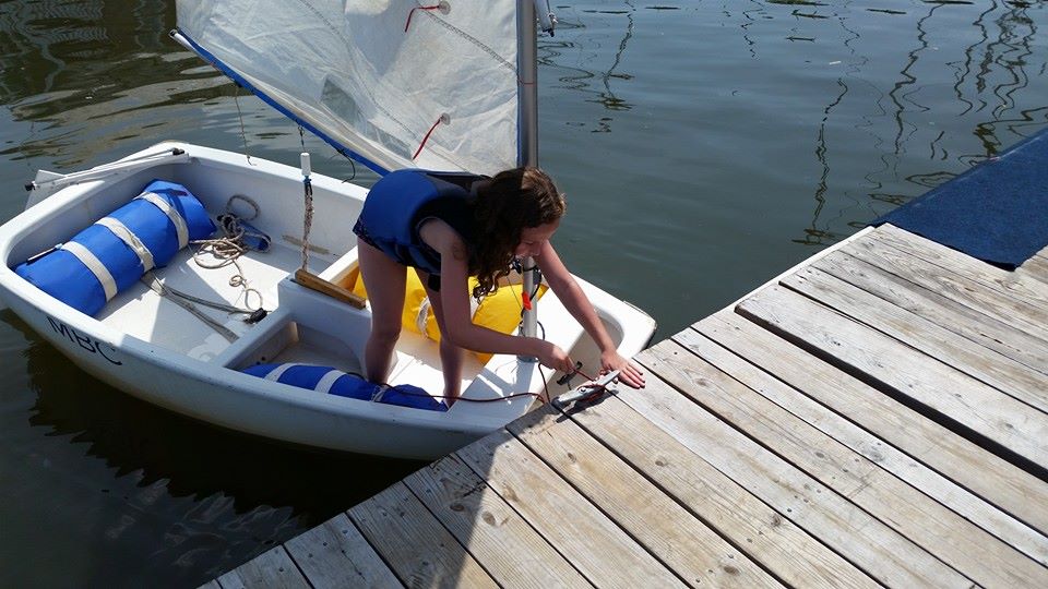 sailing on the Shrewsbury near remote tutoring in nj student docking sailboat